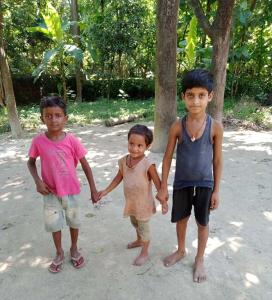 indian village poor boy happy play garden